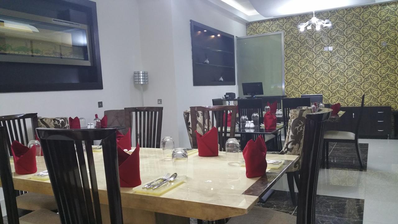 H210 Hotel Aliayabiagba Buitenkant foto